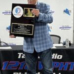 Mike Fera with plaque